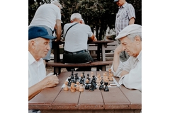 Image Two elderly men playing chess